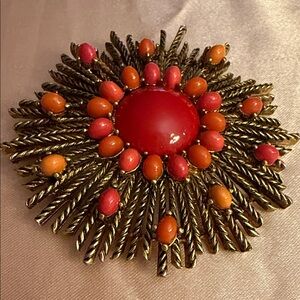 Elegant Red and Gold Floral Brooch
